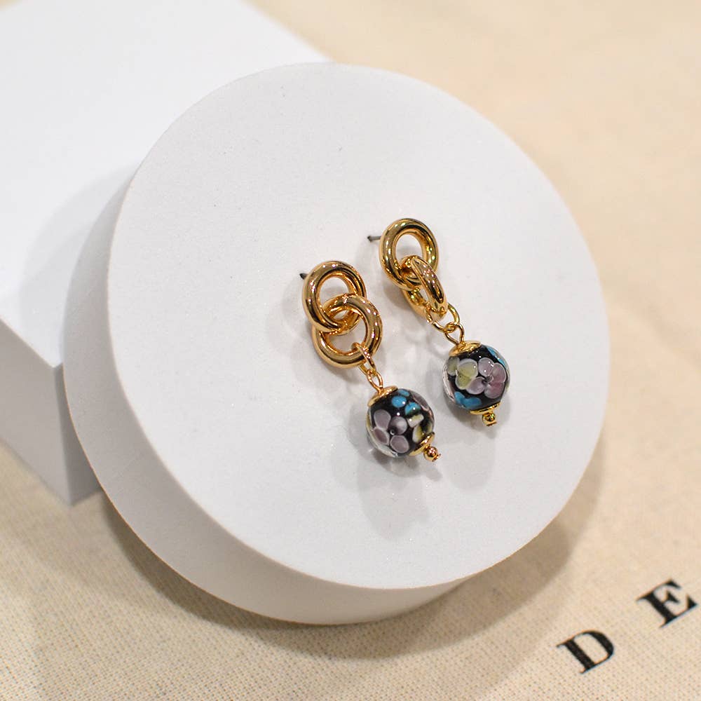 StarryNYC – Großhandel Ohrhänger – Ohrhänger in Kugelform aus Murano-Glas mit elegantem Muster7