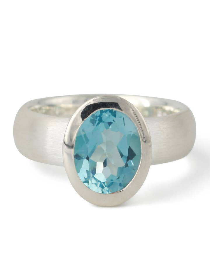 Silver ring oval setting topaz for wholesale by Campur GmbH