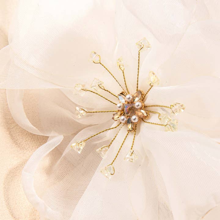 White Cheerful Shimmer Flower Headband for wholesale on Faire