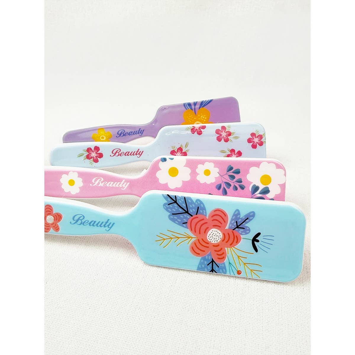 MÉLANGER LA COULEUR Brosse à cheveux rectangulaire à imprimé floral frais en vente sur Faire4