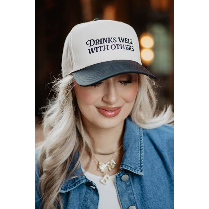 Black and Tan Drinks Well With Others Vintage Trucker Hats For Women for wholesale on Faire