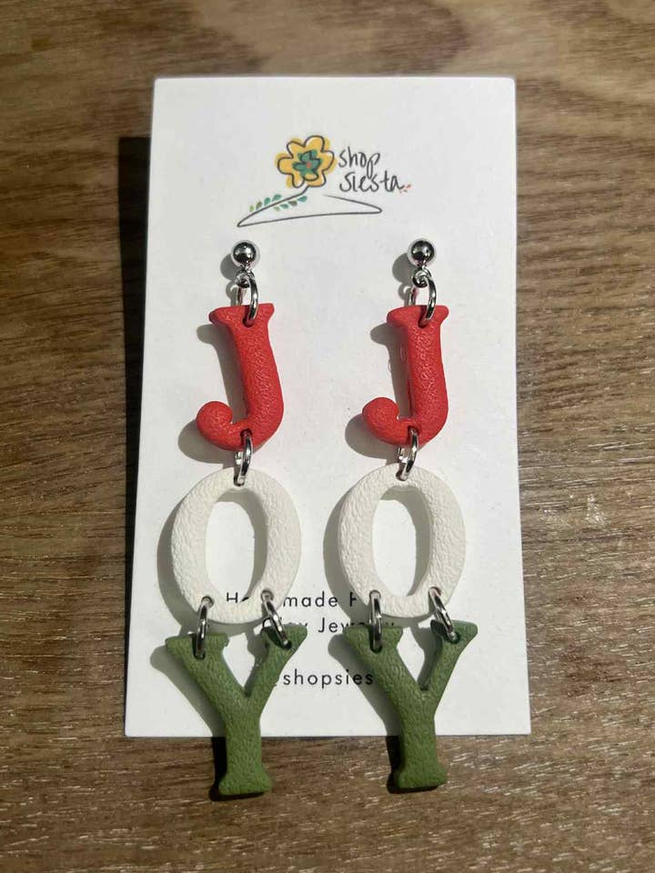 Pendentifs JOY pour la vente par Siesta Wholesale