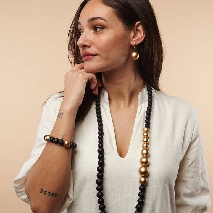 Sable Long wooden necklace Lou metallic, lightweight, minimal design, costume jewelry for wholesale on Faire