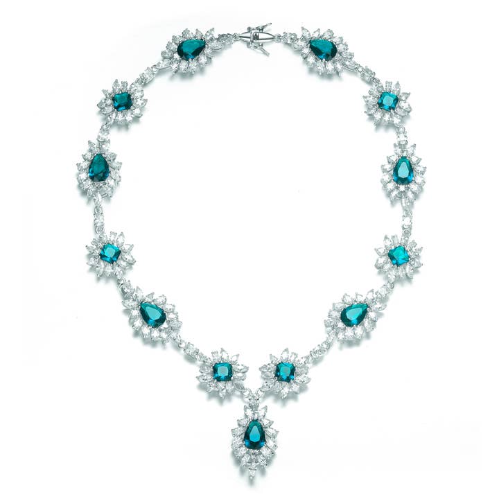 Halskette aus Sterlingsilber mit blauem kubischem Zirkonia in Blumenform für den Großhandel von Genevive