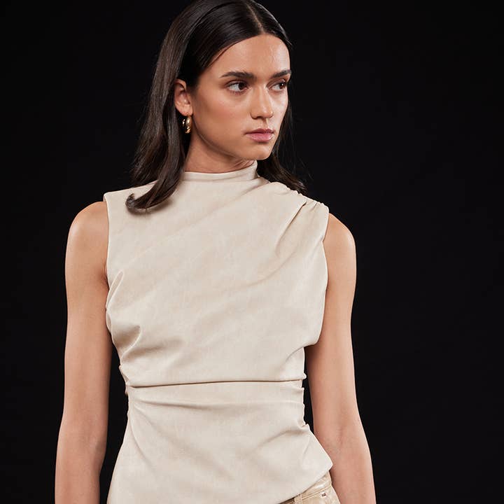ASYMMETRIC PLEATHER MOCK NECK SLEEVELESS TOP-TI6804FO and other Purchase Wholesale workwear apparel. Free Returns & Net 60 Terms on Faire trending on Faire.