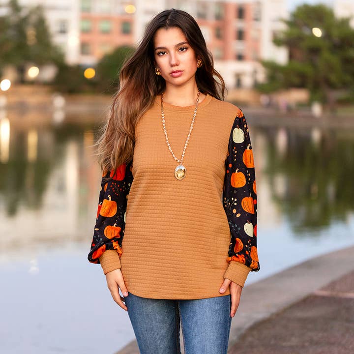 Haut gaufré à manches citrouilles d'automne pour la vente par Your Fashion Wholesale