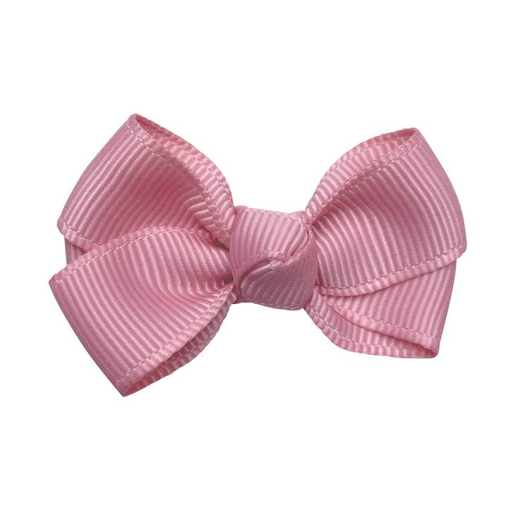 Estelle hair bow with clip in dusky pink for wholesale by La Fillette Accessories