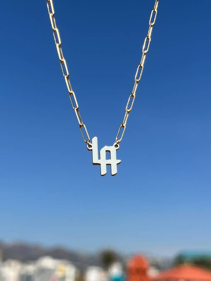 THE SIGNATURE “LA” NAMEPLATE NECKLACE for wholesale by The Folklore