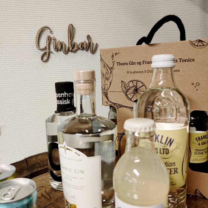 Ginbar, Krøllet skrifttype, Valnød for engroshandel hos Treend