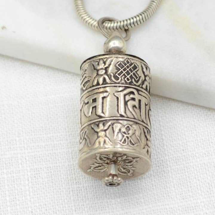 Prayer Wheel Silver Pendant for wholesale by Didi Bahini Fair Trade