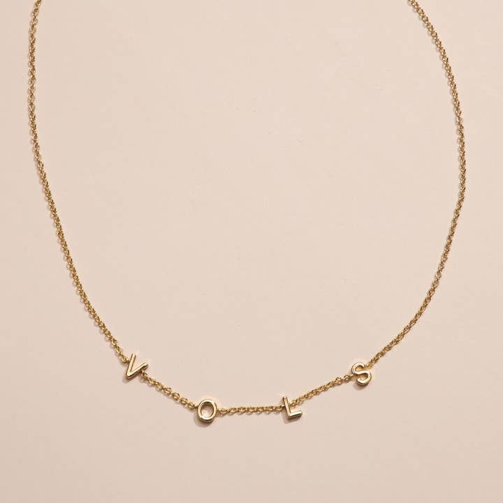 Collana con Iniziali VOLS dell'Università del Tennessee per la vendita all'ingrosso da parte di Nickel and Suede