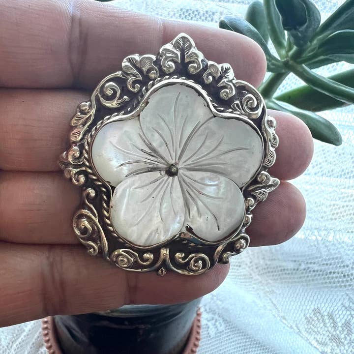 Mother of pearl floral carved pendant, Tibetan Silver for wholesale by GTG Gems Corp