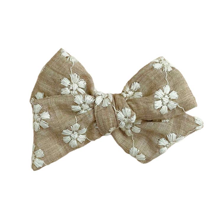 brown & white floral pinwheel bow for wholesale by Mai & I