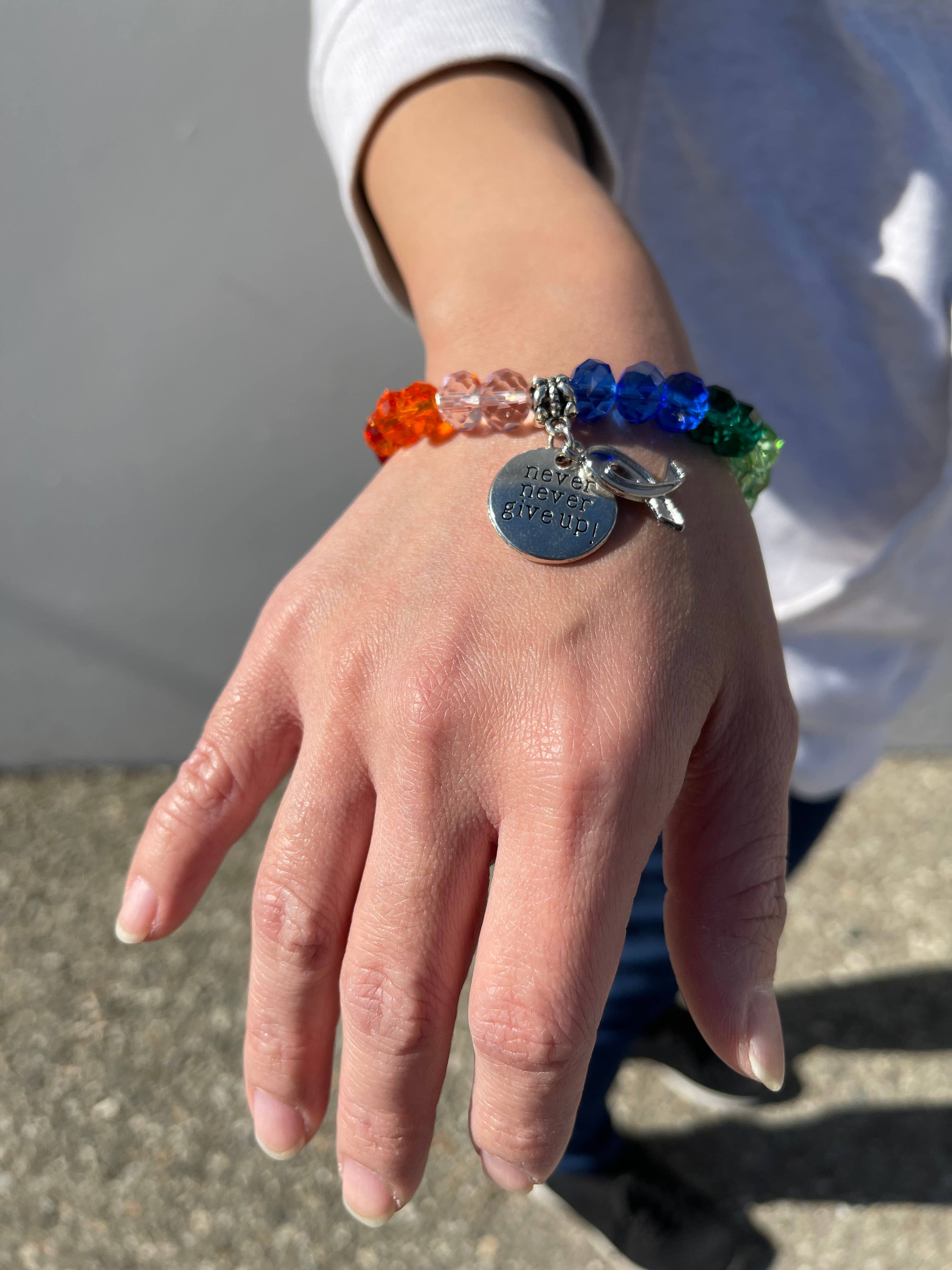 Fiona Accessories – wholesale Charm/dangle bracelet – Multicolor Cancer Awareness Bracelet For Women Survivors1