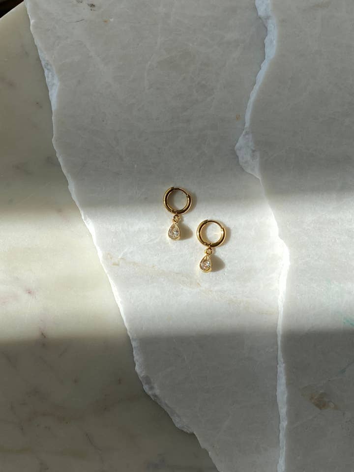 Crystal Huggie Hoops for wholesale by Sweet Grove Collective