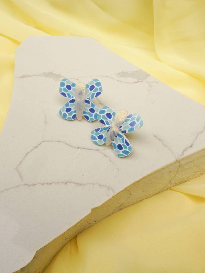 Borchie farfalla in vetro colorato per la vendita all'ingrosso da parte di Sunburst Clay Co