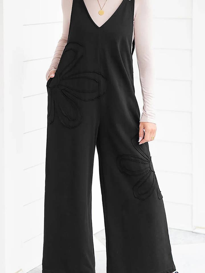 Jumpsuit met Wijde Pijpen en V-Hals met Knopen Detail voor wholesale door Mccolin