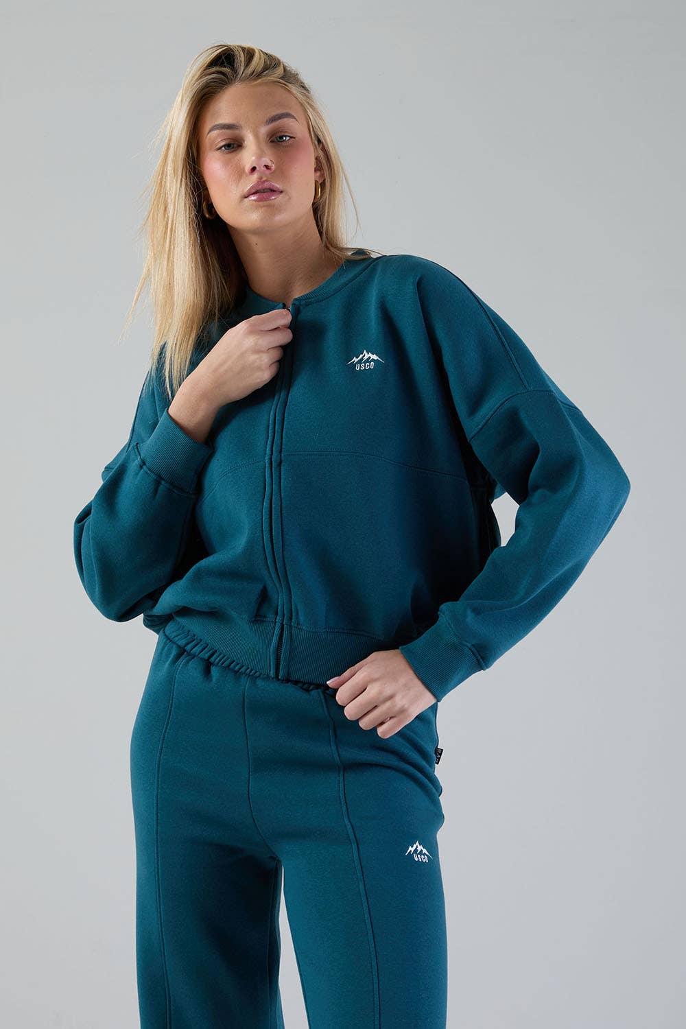 The Apex Tracksuit in Teal for wholesale on Faire3