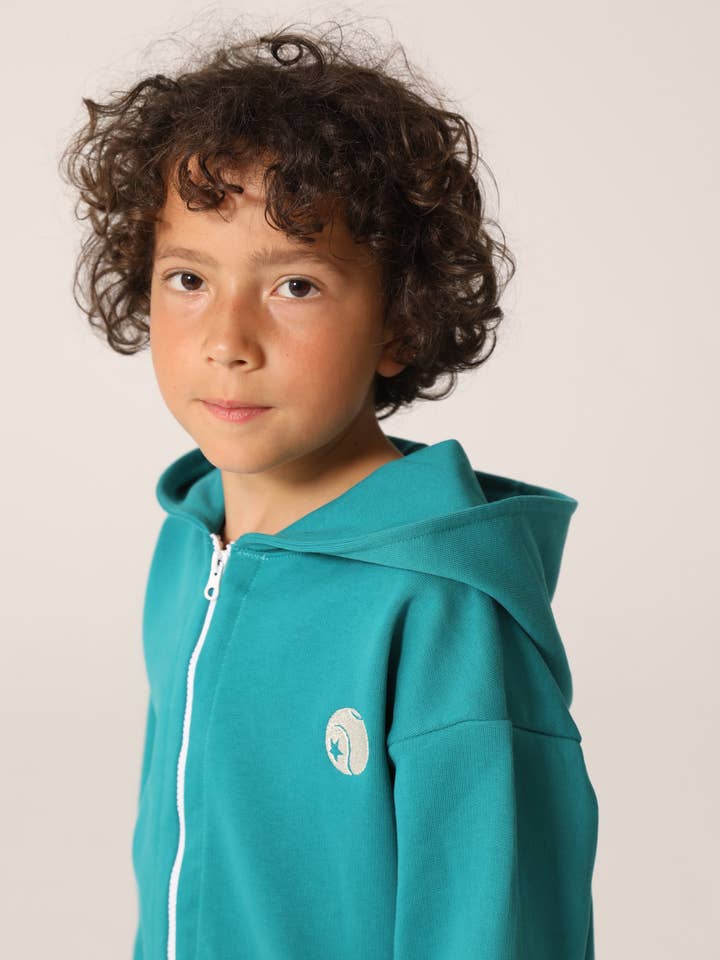 CHAQUETA DE TENIS CON CAPUCHA BASELINE CLASSIC para venta al por mayor de Raquette