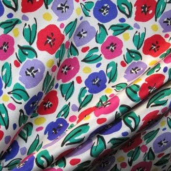 Multicolor designer printed silk charmeuse for wholesale by Exquisite Fabrics