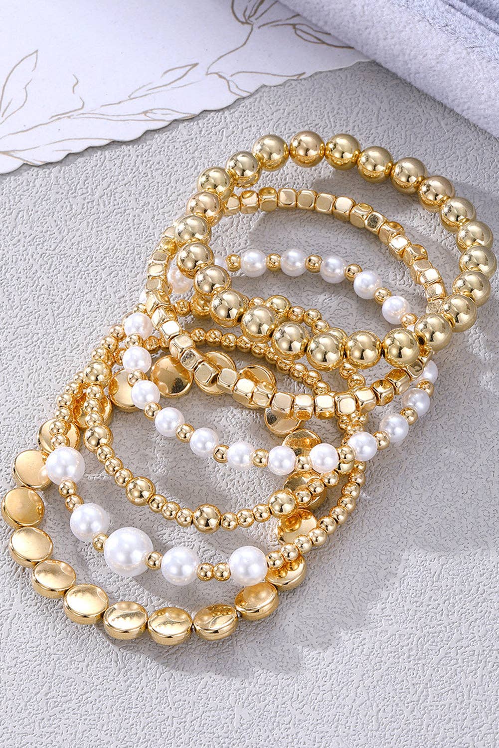 Gold Minimalist Pearl Beaded Multi Layer Elastic Bracelets for wholesale on Faire1