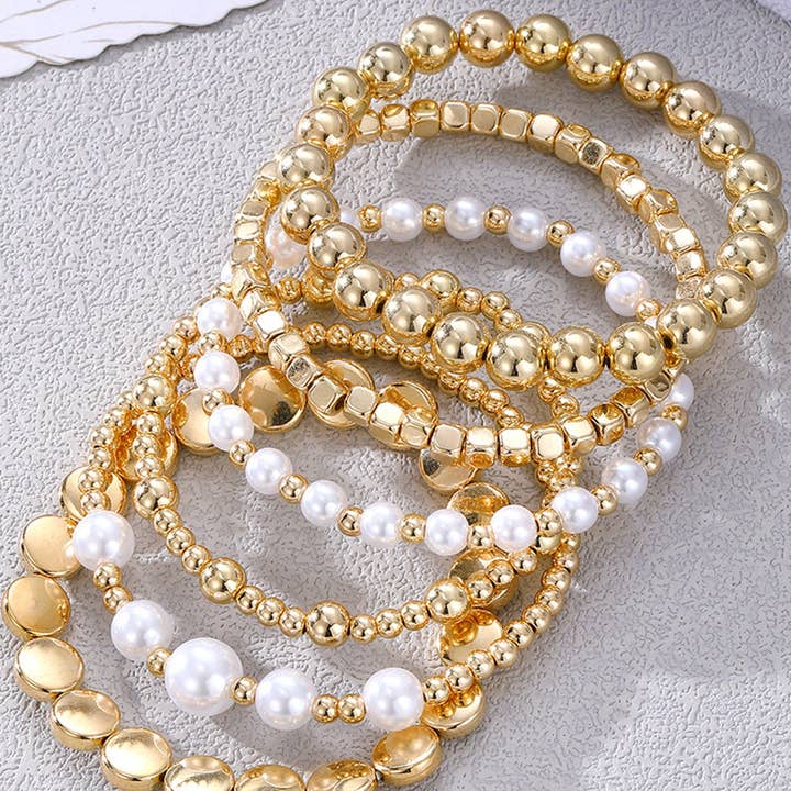 Gold Minimalist Pearl Beaded Multi Layer Elastic Bracelets for wholesale on Faire1