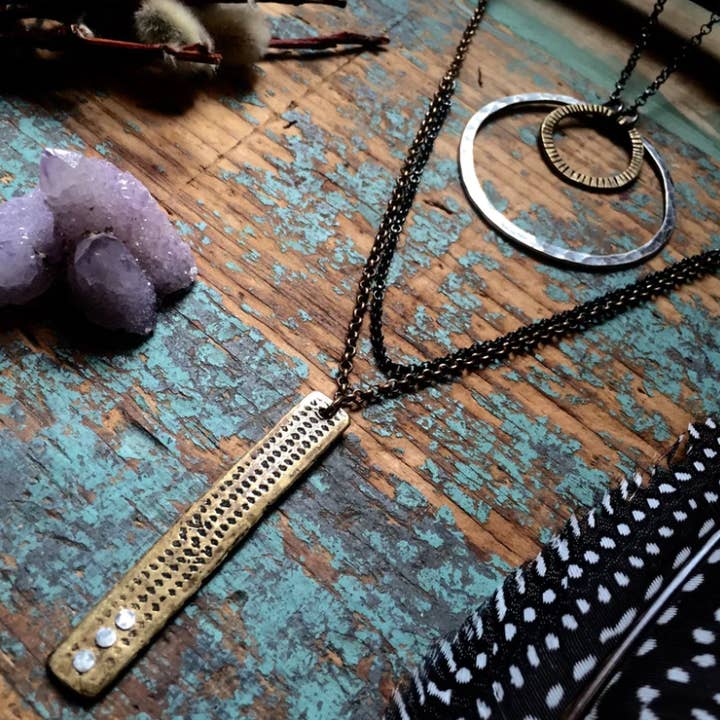 Riveted Relic Reversible Necklace in Brass for wholesale by Jennifer Kahn Jewelry