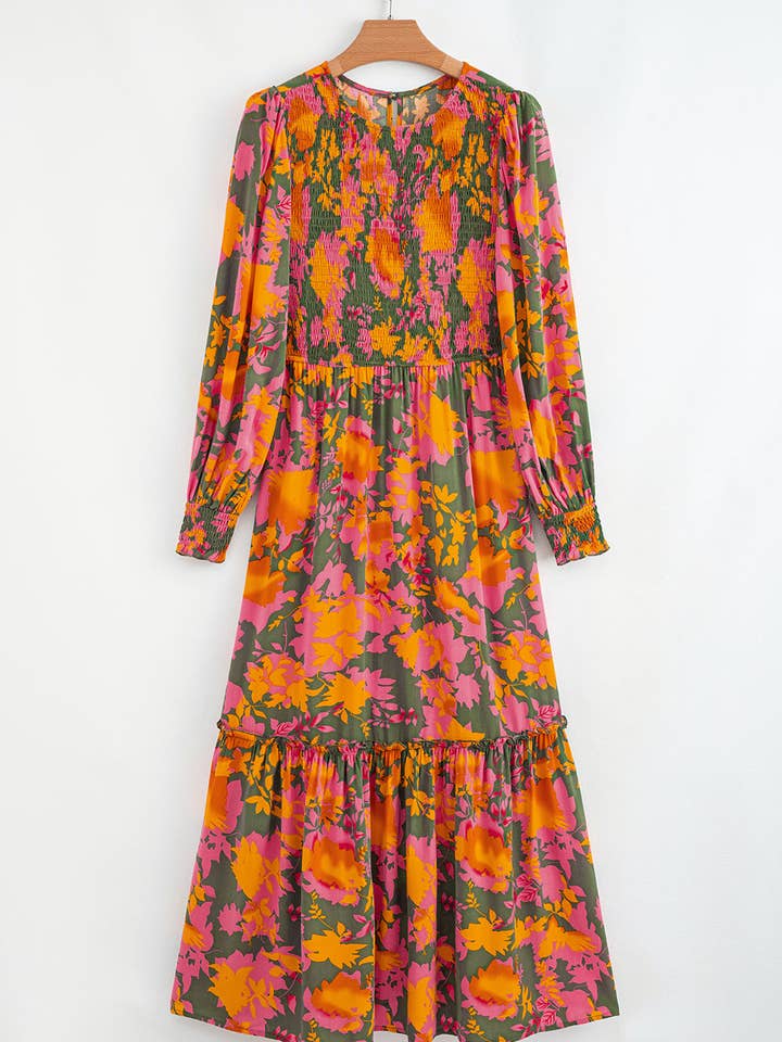 Orange Orange blommig klänning med puffärmar, smockad liv och volanger. för wholesale på Faire7