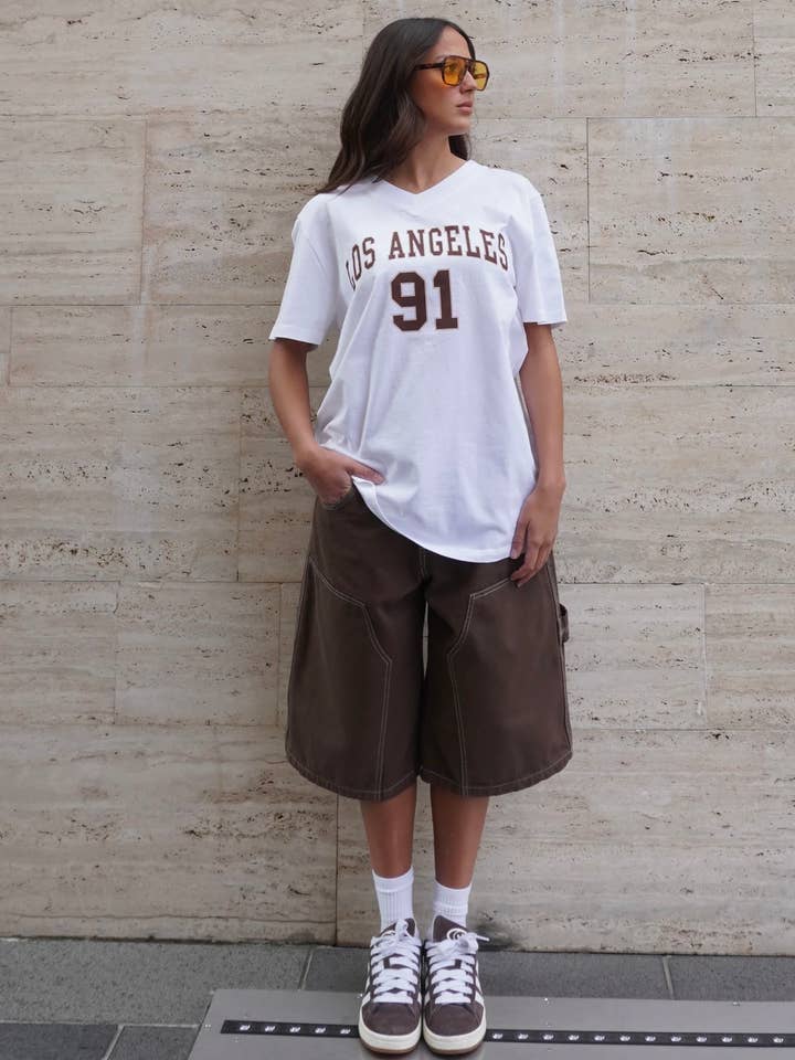 Blanc T-shirt oversize à col en V Los Angeles en vente sur Faire0