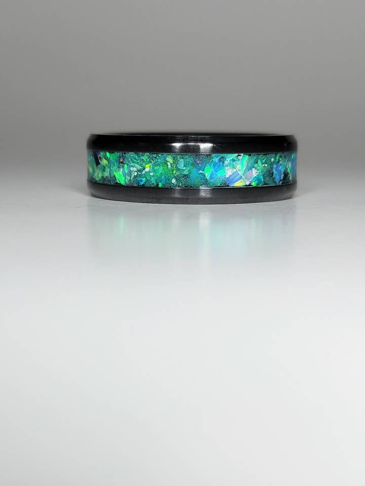 Black Ceramic Opal Ring UV Glow Powder for wholesale by Natural Evolution Design