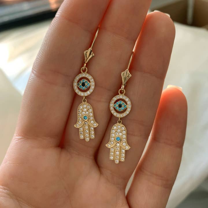 Kimiya Designs - Wholesale Dangle Earrings - Hamsa Evil Eye Earrings with Blue Gemstones