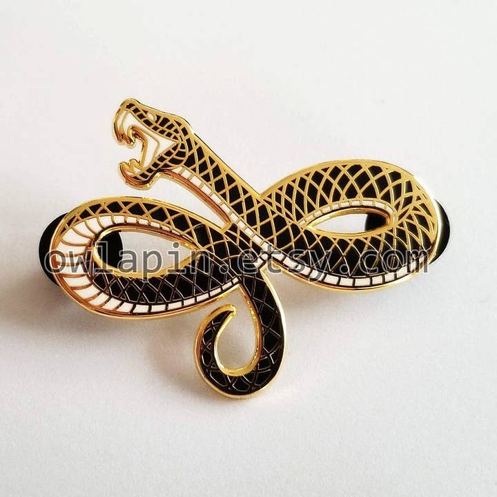 Black Gold Snake Enamel Pin 2" for wholesale by Triclops Rabbit