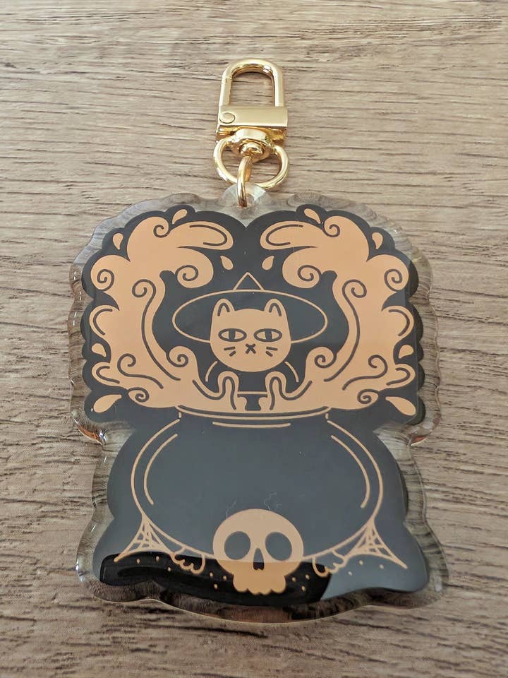 Chat porte-chaudron sorcière - Porte-clés mignon et effrayant pour la vente par Sadsquatch