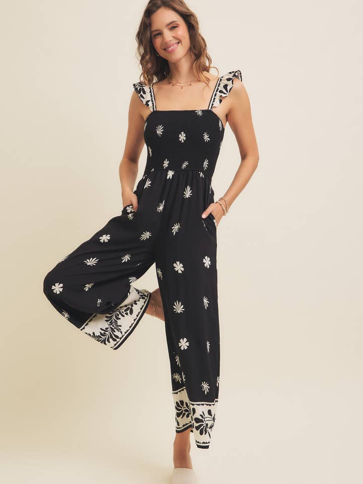 BORDER PRINT SMOCKED JUMPSUIT WITH RUFFLED STRAPS for wholesale by in february