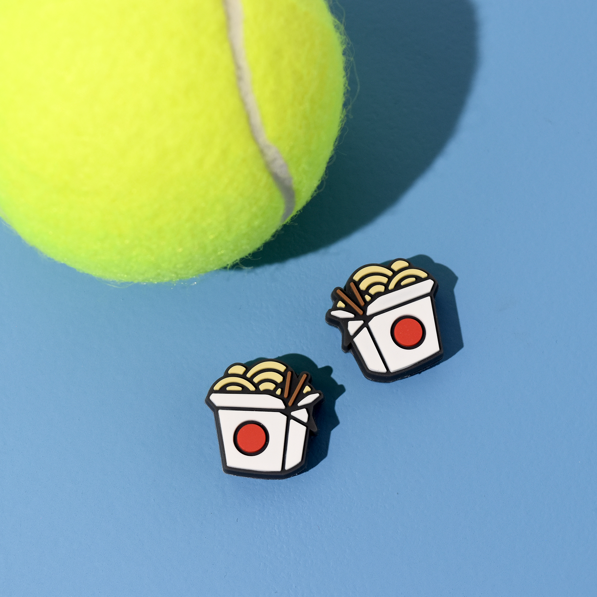 Racquet Inc – Engroshandel Sportsudstyr – Lækre dæmpere - (2-pakke) Takeout-boks - Food Tennis Vibrationsdæmper4