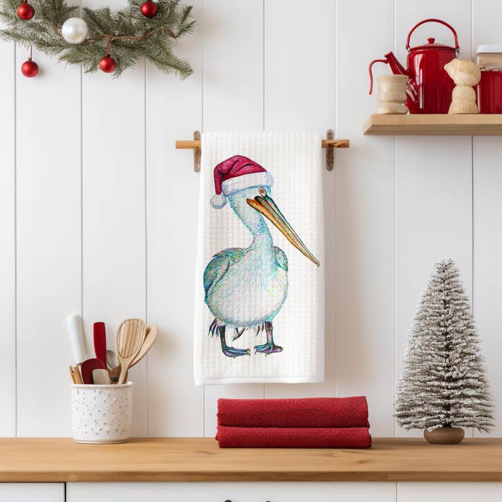Torchon d'art aquarelle Père Noël Pélican 16" x 24" pour la vente par The Ship's Hold