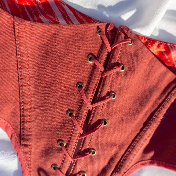 Red denim under-bust corset reworked Pre-Order for wholesale by MARIA JOVREA