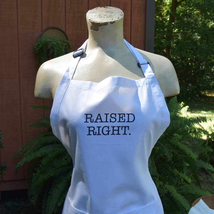 The Raised Right Apron for wholesale by Down South House & Home