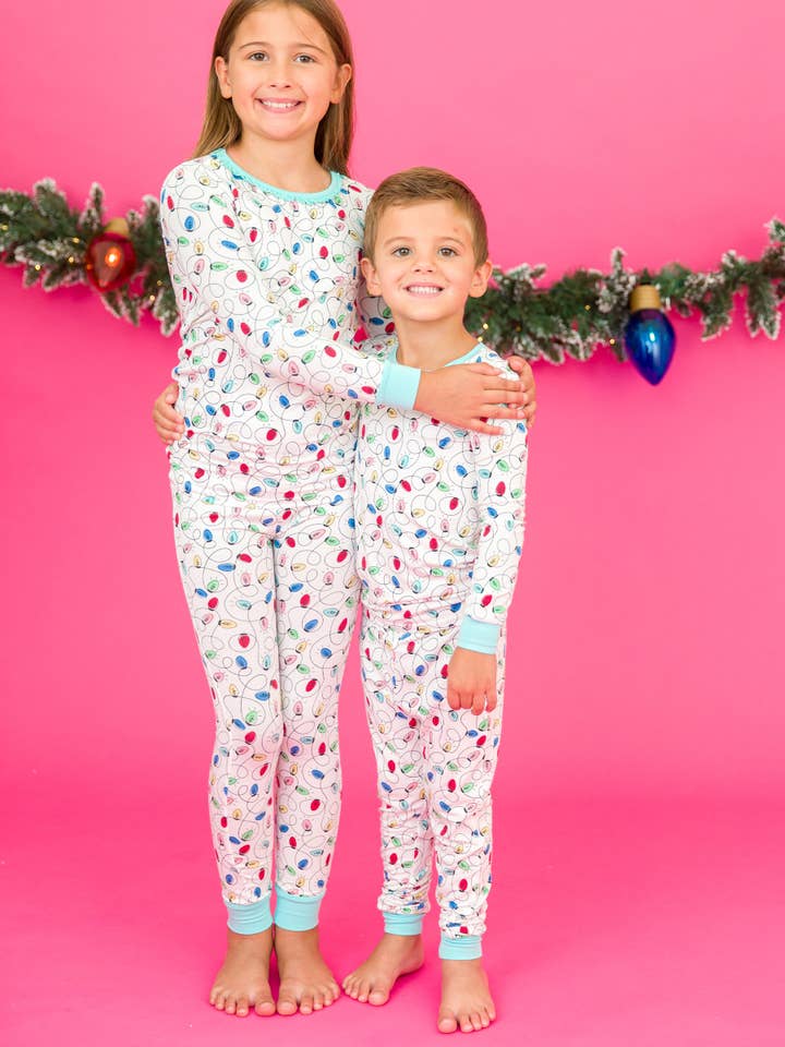 Off White Girls Holiday Lights Bamboo Viscose Ruffle Long Sleeve Pajama Set
for wholesale on Faire