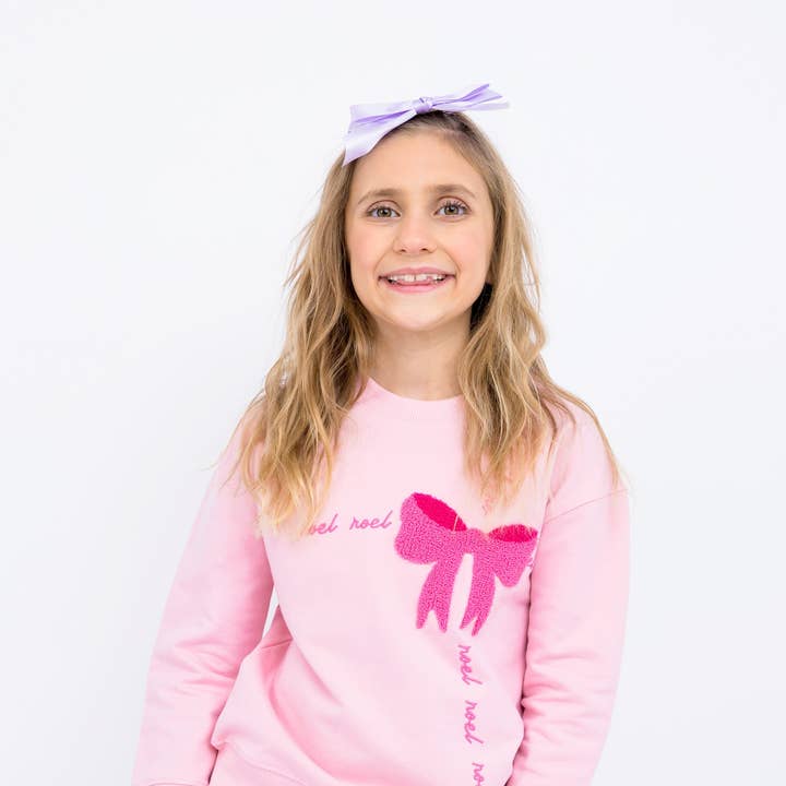 Bow Sweatshirt and other Purchase Wholesale iron on appliques. Free Returns & Net 60 Terms on Faire trending on Faire.