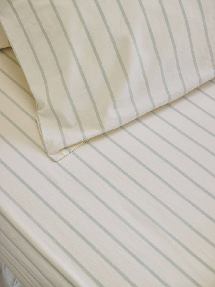 Mellow Green Slumber Stripe Cotton Fitted Sheet for wholesale by Piglet in Bed USA