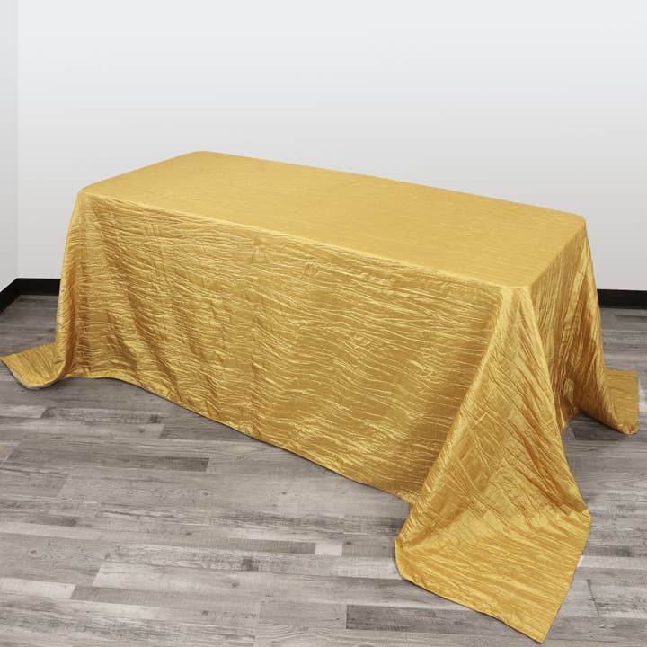 90 x 132 inch Crinkle Taffeta Rectangular Tablecloth Gold for wholesale by YOUR CHAIR COVERS