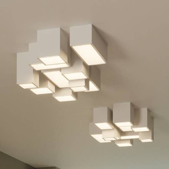 Living modular ceiling lamp in paintable white plaster for wholesale by Gruppo F.T