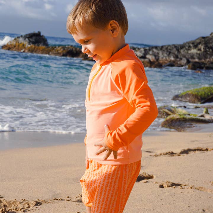 Rash Guard in Sun Orange for wholesale by Little Lilo Hawaii