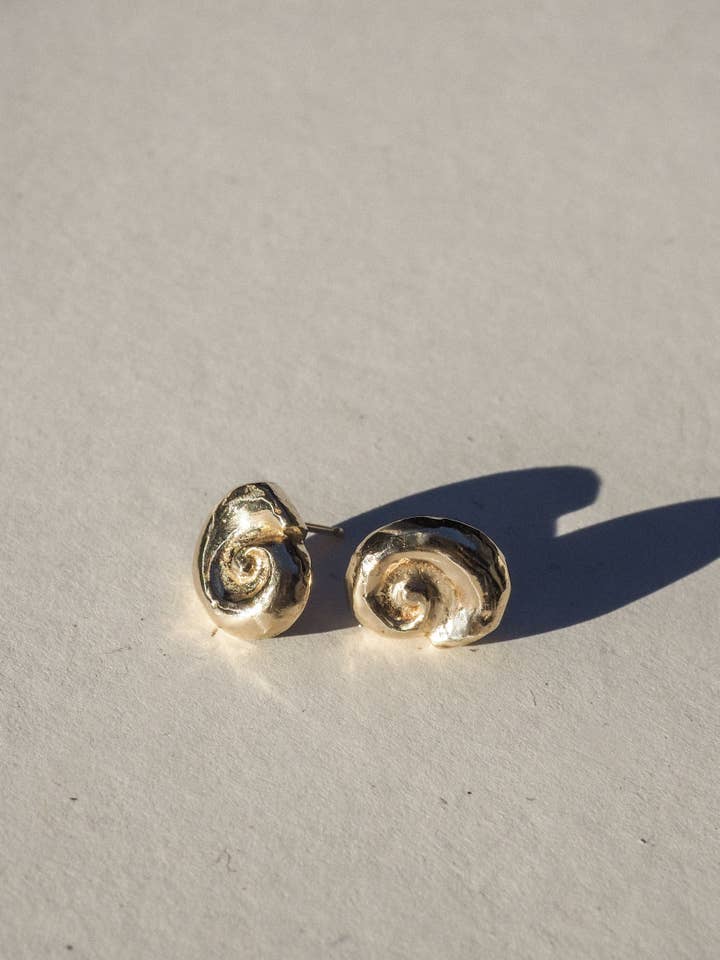 petite ammonite studs | organic shell earrings | bronze for wholesale by Emily Hartwell