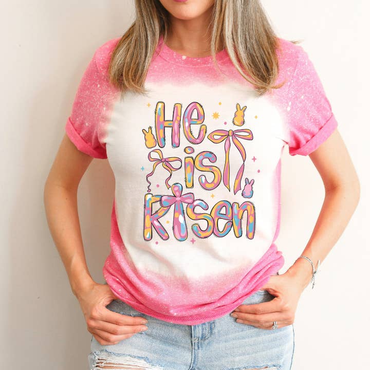 T-shirt de Pâques blanchi "Il est ressuscité" pour la vente par Hello Gorgeous Apparel