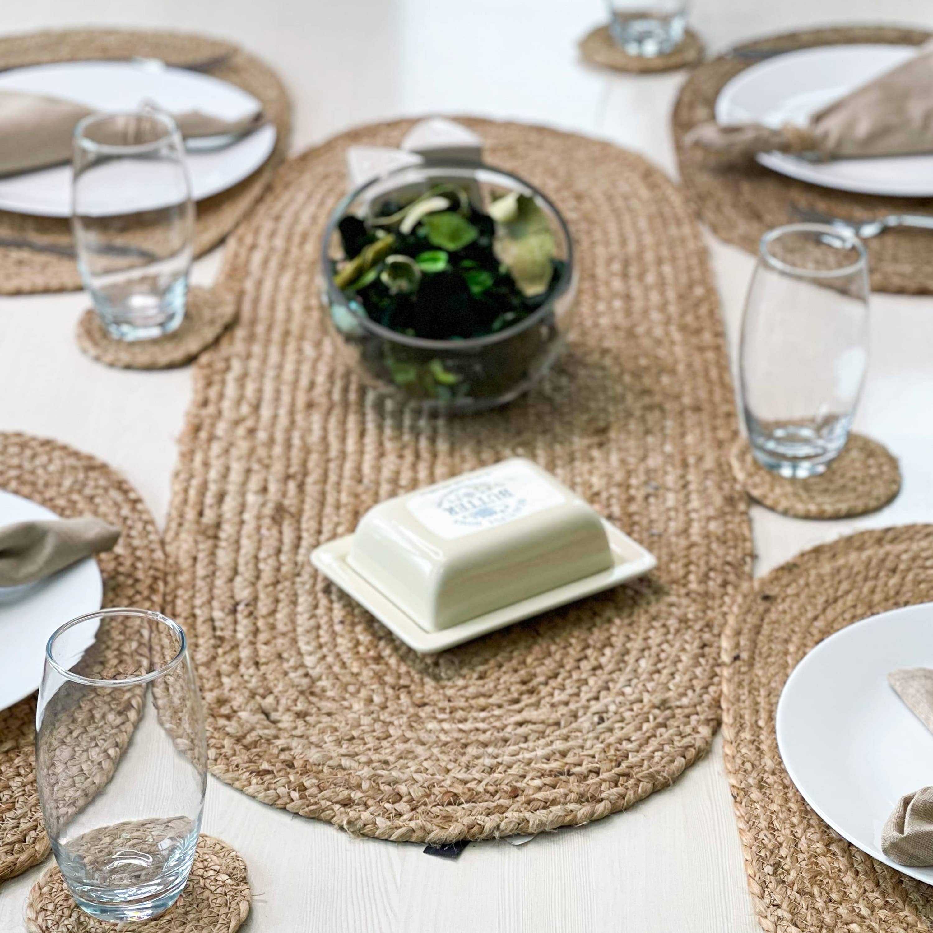OVAL BRAIDED TABLE RUNNER, NATURAL JUTE, 13'' x 36''. for wholesale on Faire0