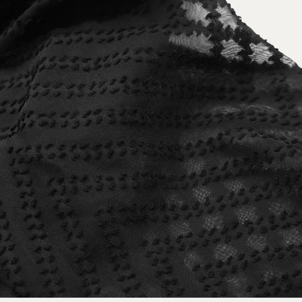 Noir Combinaison Grace noire transparente à col en V et manches longues et jambes larges en vente sur Faire7