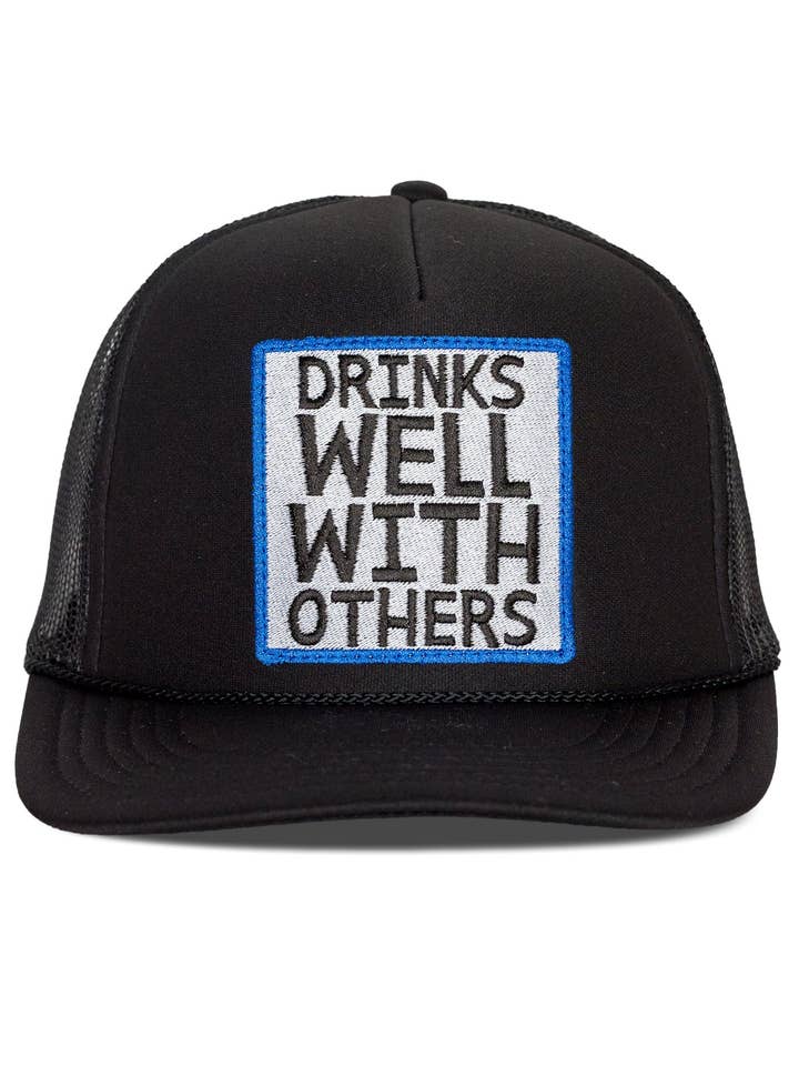 Drinks Well With Others Trucker Hat in Black for wholesale by Friday Feelin'