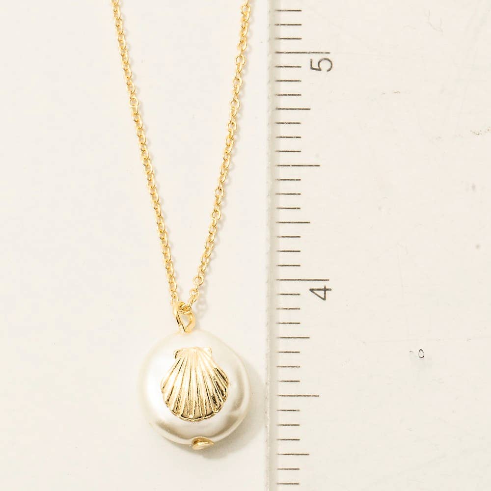 G Collana con Pendente di Perla a Conchiglia in vendita all'ingrosso su Faire3